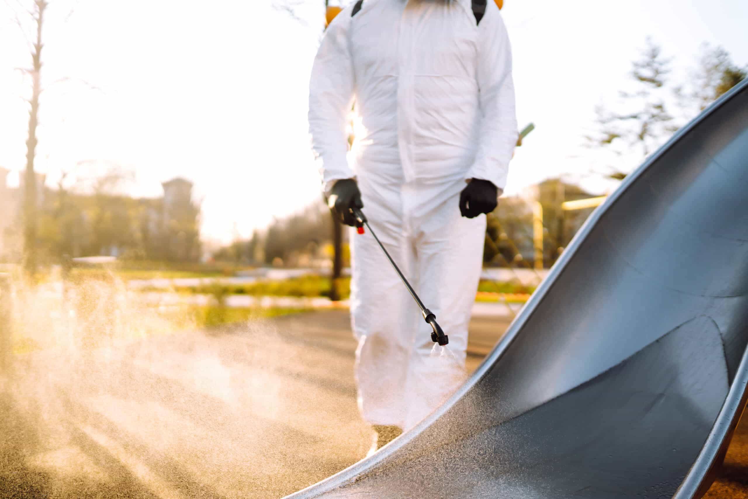 man-wearing-protective-suit-disinfecting-the-playg-2025-03-07-13-09-01-utc-scaled